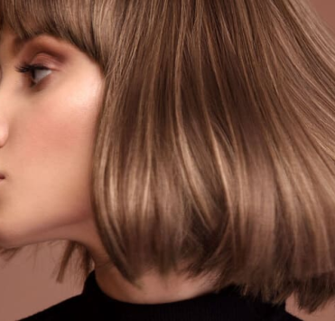 Модні жіночі стрижки 2022 для волосся середньої довжини