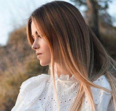 Модні жіночі стрижки 2025 на довге волосся